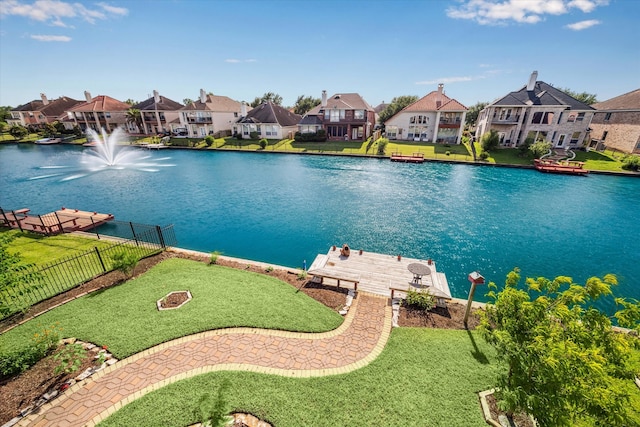 dock featuring a water view and a residential view