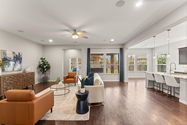 1830 Britton Key Ln, Spring, TX 77386 - living room with plenty of natural light, recessed lighting, dark wood-style floors, and a ceiling fan