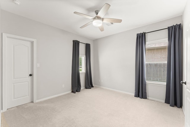 1830 Britton Key Ln, Spring, TX 77386 - empty room featuring carpet flooring, a ceiling fan, baseboards, and a smoke detector