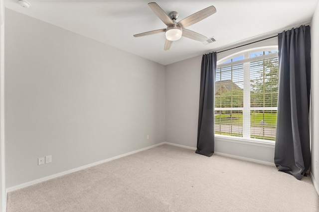1830 Britton Key Ln, Spring, TX 77386 - spare room with light colored carpet, baseboards, and ceiling fan