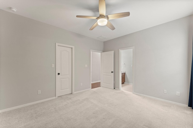 1830 Britton Key Ln, Spring, TX 77386 - unfurnished bedroom featuring light carpet, baseboards, and connected bathroom