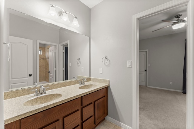 1830 Britton Key Ln, Spring, TX 77386 - bathroom featuring double vanity, ceiling fan, and baseboards