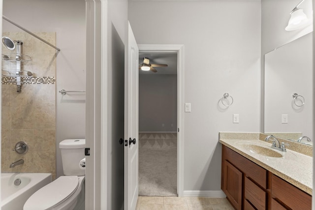 1830 Britton Key Ln, Spring, TX 77386 - bathroom featuring vanity, toilet, a ceiling fan, tile patterned flooring, and bathtub / shower combination