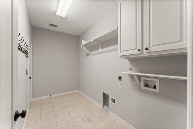 1830 Britton Key Ln, Spring, TX 77386 - laundry room with electric dryer hookup, cabinet space, hookup for a washing machine, and baseboards