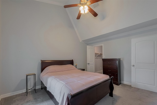64 Hideaway Dr, Friendswood, TX 77546 - bedroom featuring light carpet, crown molding, baseboards, a walk in closet, and high vaulted ceiling