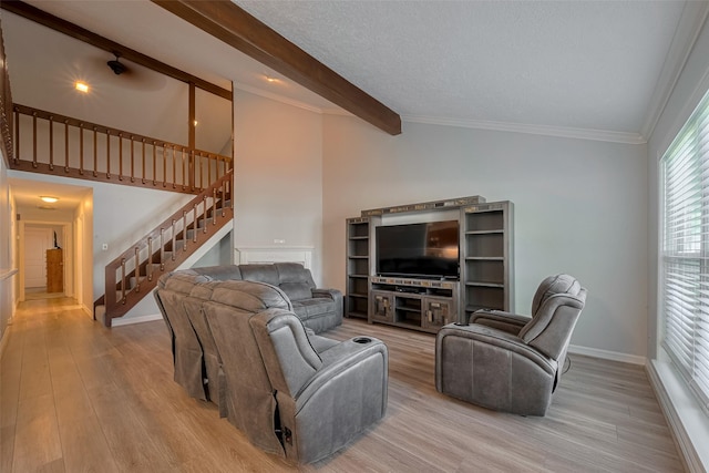 64 Hideaway Dr, Friendswood, TX 77546 - living area with light wood-type flooring, stairs, baseboards, and crown molding