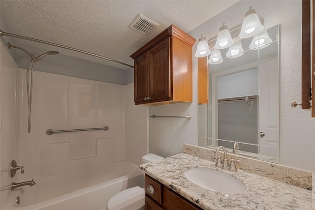 64 Hideaway Dr, Friendswood, TX 77546 - full bathroom featuring  shower combination, toilet, vanity, and a textured ceiling