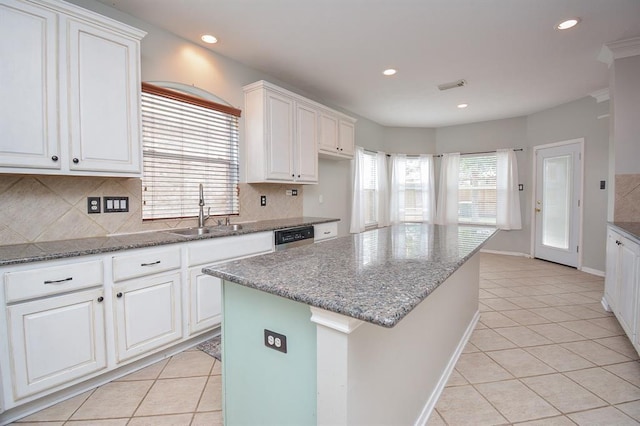 16535 Ruby Meadow Dr, Houston, TX 77095 - kitchen featuring a sink, light tile patterned floors, tasteful backsplash, recessed lighting, and dishwasher