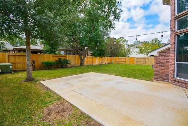 16535 Ruby Meadow Dr, Houston, TX 77095 - view of yard with a patio area and a playground
