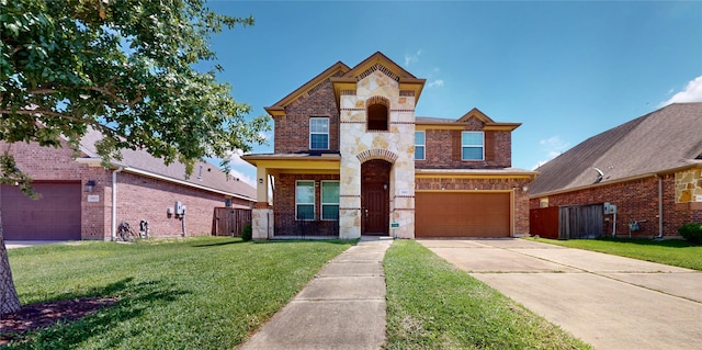 1911 Thunder Ridge Way, Houston, TX 77089 - view of front of property featuring concrete driveway, brick siding, a garage, and stone siding