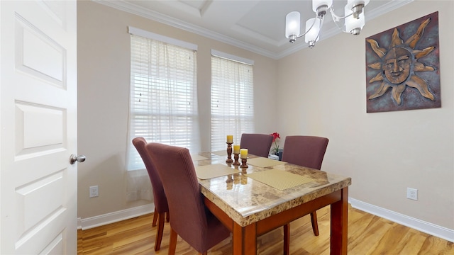 1911 Thunder Ridge Way, Houston, TX 77089 - dining area featuring a chandelier, light wood-style flooring, baseboards, and ornamental molding