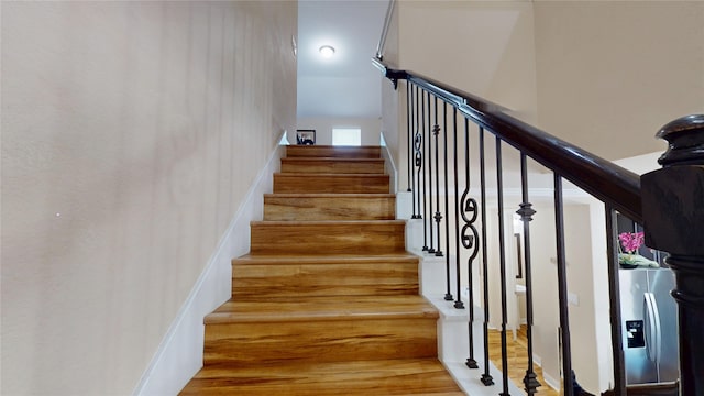 1911 Thunder Ridge Way, Houston, TX 77089 - stairway featuring wood finished floors