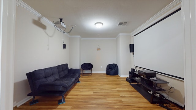 1911 Thunder Ridge Way, Houston, TX 77089 - cinema with light wood-style flooring, ornamental molding, and baseboards