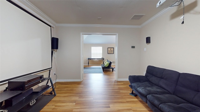1911 Thunder Ridge Way, Houston, TX 77089 - living room with light wood-type flooring, crown molding, and baseboards