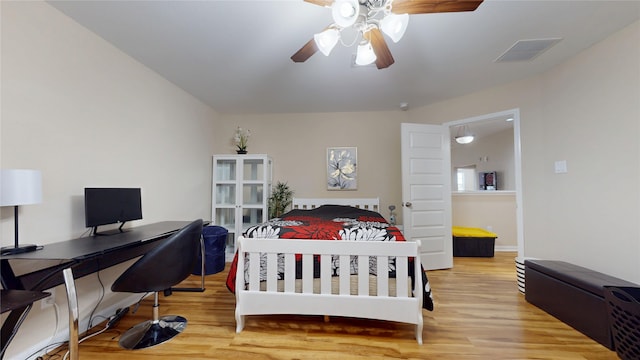 1911 Thunder Ridge Way, Houston, TX 77089 - bedroom with wood finished floors, an office area, and ceiling fan
