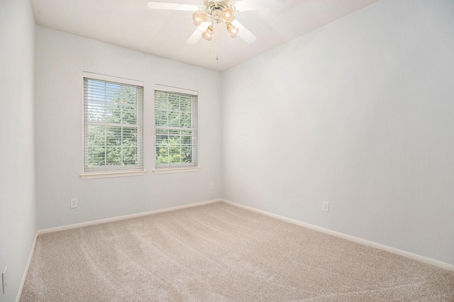 2385 Golden Shores Ln, League City, TX 77573 - carpeted spare room featuring baseboards and a ceiling fan
