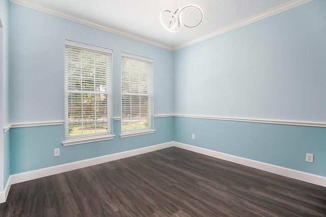 2385 Golden Shores Ln, League City, TX 77573 - unfurnished room with a chandelier, dark wood-type flooring, crown molding, healthy amount of natural light, and baseboards