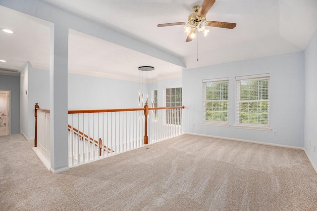 2385 Golden Shores Ln, League City, TX 77573 - carpeted spare room with a ceiling fan and baseboards