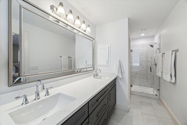 1117 W 22nd St Unit C, Houston, TX 77008 - bathroom featuring baseboards, marble look tile flooring, a shower stall, and double vanity