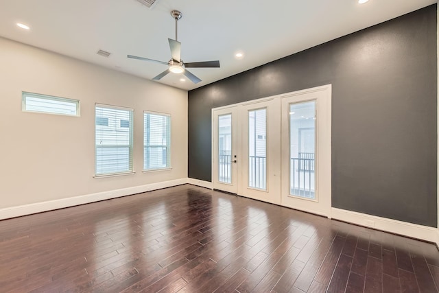 407 N Nagle St Unit E, Houston, TX 77003 - unfurnished room with a ceiling fan, baseboards, dark wood-type flooring, and recessed lighting