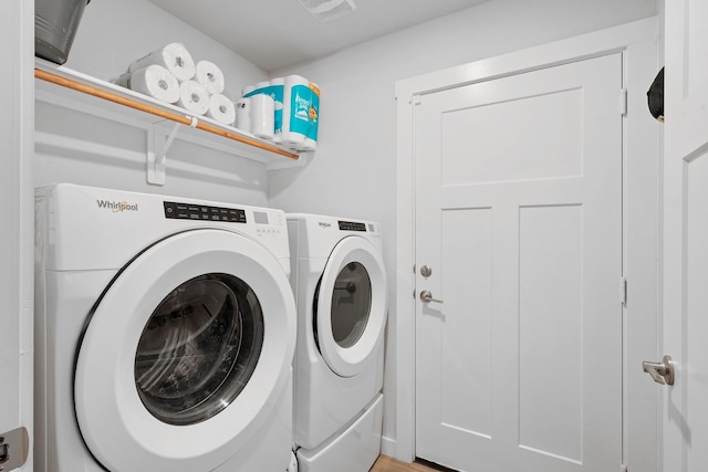 1242 Amistad Loop, College Station, TX 77845 - laundry room featuring separate washer and dryer