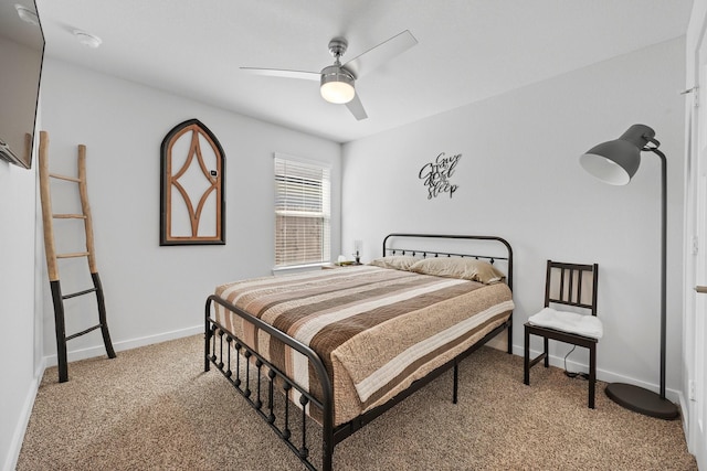 1242 Amistad Loop, College Station, TX 77845 - bedroom featuring light colored carpet, a ceiling fan, and baseboards