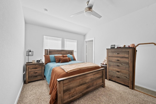 1242 Amistad Loop, College Station, TX 77845 - bedroom featuring light carpet, a ceiling fan, and baseboards
