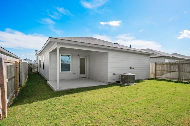 1242 Amistad Loop, College Station, TX 77845 - rear view of property with central air condition unit and a patio