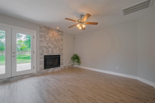 8547 Sparkling Springs Dr, Houston, TX 77095 - unfurnished living room featuring french doors, wood finished floors, and baseboards