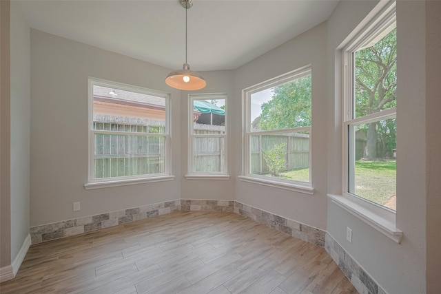 8547 Sparkling Springs Dr, Houston, TX 77095 - unfurnished dining area featuring wood finished floors and baseboards