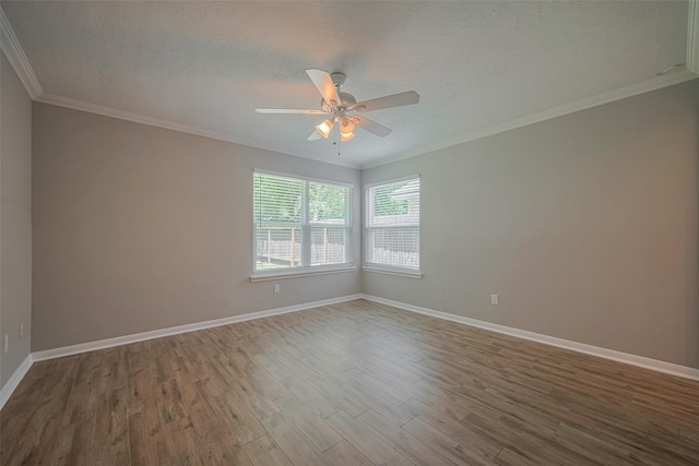 8547 Sparkling Springs Dr, Houston, TX 77095 - empty room with wood finished floors, a ceiling fan, baseboards, a textured ceiling, and ornamental molding
