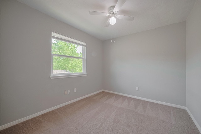 8547 Sparkling Springs Dr, Houston, TX 77095 - unfurnished room with baseboards, light colored carpet, and ceiling fan