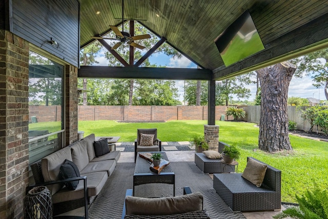 view of patio featuring a ceiling fan and outdoor lounge area
