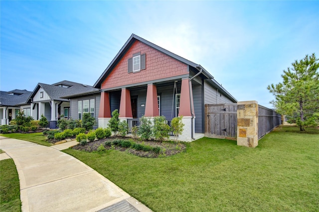 28723 Eden Creek Trl, Fulshear, TX 77441 - craftsman-style home featuring a front yard and covered porch