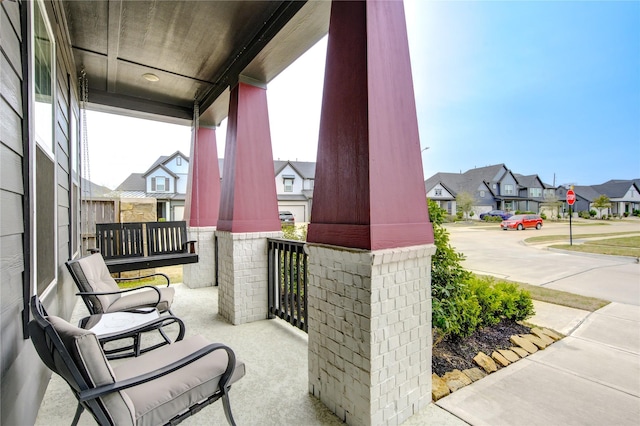 28723 Eden Creek Trl, Fulshear, TX 77441 - view of patio featuring covered porch and a residential view