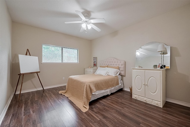 14844 Pollux Dr, Willis, TX 77318 - bedroom with wood finished floors, baseboards, and ceiling fan