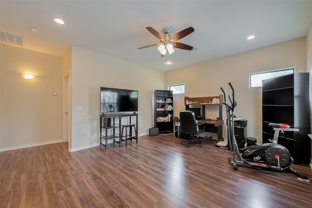 14844 Pollux Dr, Willis, TX 77318 - home office with wood finished floors, a ceiling fan, healthy amount of natural light, recessed lighting, and baseboards