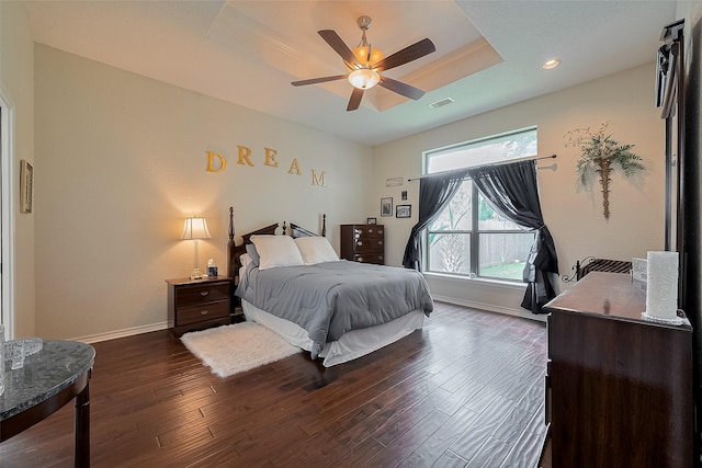 14844 Pollux Dr, Willis, TX 77318 - bedroom featuring baseboards, wood finished floors, recessed lighting, ceiling fan, and a raised ceiling