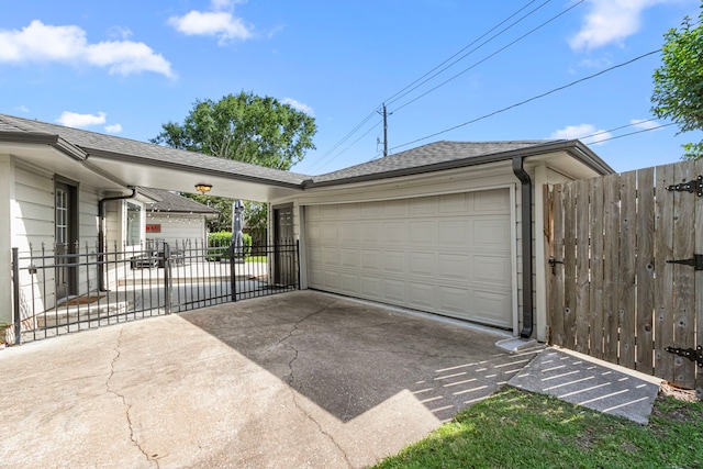 garage featuring fence