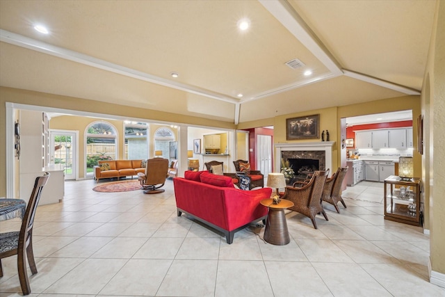 4114 Plumtree Ln, Seabrook, TX 77586 - living room featuring a fireplace, vaulted ceiling, light tile patterned floors, and recessed lighting