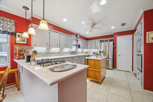 4114 Plumtree Ln, Seabrook, TX 77586 - kitchen featuring stainless steel fridge with ice dispenser, wall oven, ornamental molding, a peninsula, and light countertops