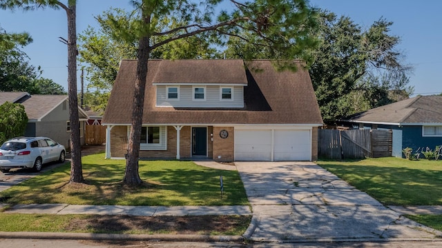 11106 Sagevalley Dr N, Houston, TX 77089 - view of front of house featuring concrete driveway, a garage, brick siding, and a gate