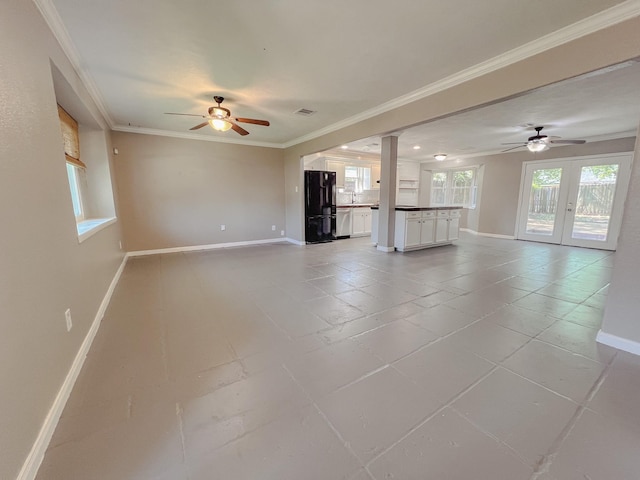 11106 Sagevalley Dr N, Houston, TX 77089 - unfurnished living room featuring a ceiling fan, baseboards, ornamental molding, decorative columns, and french doors