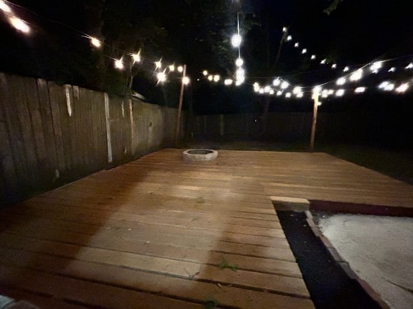11106 Sagevalley Dr N, Houston, TX 77089 - deck at night featuring a fenced backyard