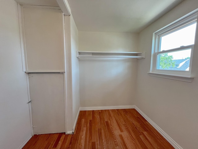 11106 Sagevalley Dr N, Houston, TX 77089 - walk in closet with wood finished floors