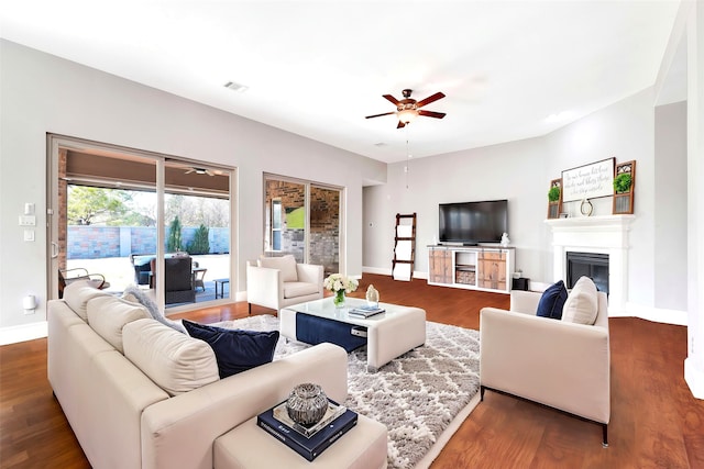 30622 Indigo Falls Dr, Brookshire, TX 77423 - living room with a ceiling fan, wood finished floors, and baseboards