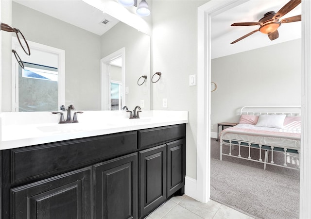 30622 Indigo Falls Dr, Brookshire, TX 77423 - full bath featuring tile patterned floors, ceiling fan, and double vanity