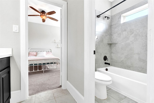 30622 Indigo Falls Dr, Brookshire, TX 77423 - ensuite bathroom with tile patterned flooring, toilet, ceiling fan, tub / shower combination, and vanity