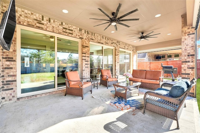 30622 Indigo Falls Dr, Brookshire, TX 77423 - view of patio / terrace with fence, a ceiling fan, and an outdoor hangout area