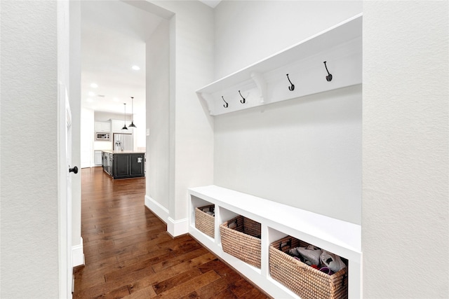 30622 Indigo Falls Dr, Brookshire, TX 77423 - mudroom featuring dark wood-type flooring and recessed lighting